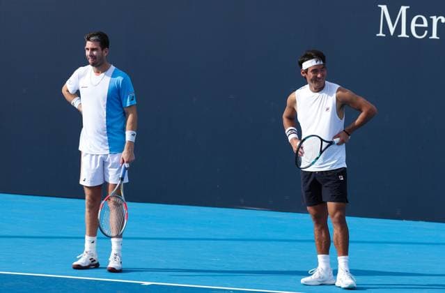 (250925) -- BEIJING, Sept. 25, 2025 -- Bu Yunchaokete (R) Cameron Norrie react during the men s doubles first round match between Bu Yunchaokete (China) Cameron Norrie (Britain) and Marcelo Melo (Brazil) Alexander Zverev (Germany) at 2025 China Open tennis tournament in Beijing, China, Sept. 25, 2025. (Photo by Xinhua) (SP)CHINA-BEIJING-TENNIS-CHINA OPEN-MEN S DOUBLES-FIRST ROUND (CN) MaxZihan 