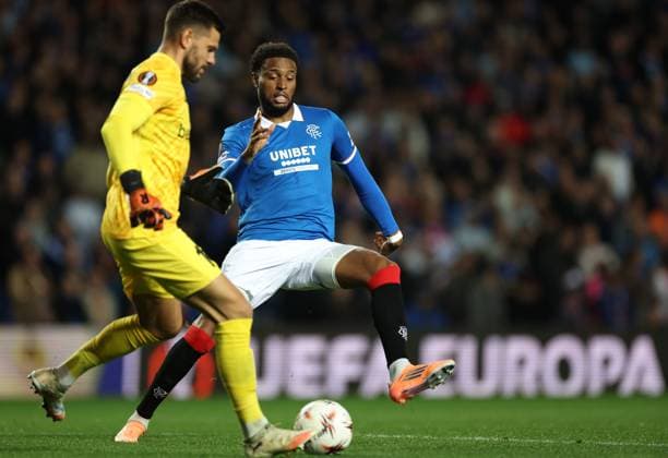 Youssef Chermiti of Rangers and Genk goalkeeper Hendrik Van Crombrugge during the Europa League league phase match at Ibrox Stadium, Glasgow. Rangers v Genk - UEFA Europa League - League Phase - Ibrox Stadium, Glasgow, Lanarkshire, Scotland, UK - 25 Sep 2025Glasgow Ibrox Lanarkshire United Kingdom  Copyright: xO Rourke RangersxFC Shutterstockx 15504270i