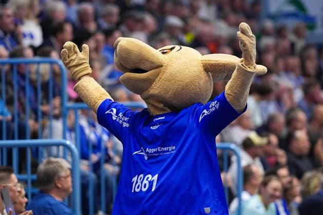 25.09.2025, xydrx, Handball, 1.HBL, VFL Gummersbach - TVB Stuttgart, Schwalbe-Arena: Gummy das Maskotchen heizt den Fans ein Nordrhein-Westfahlen Deutschland