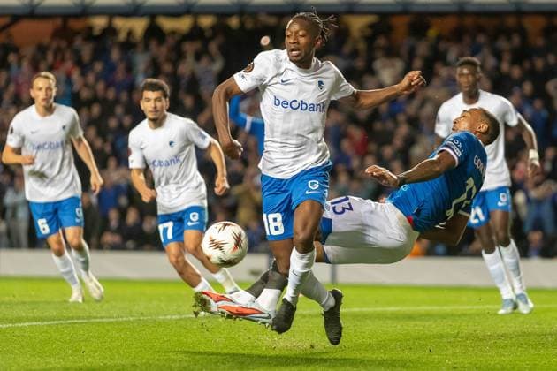 Rangers v KRC Genk Europa League 25 09 2025. Derek Cornelius of Rangers FC goes down under a heavy challenge from Joris Kayembe of KRC Genk during the UEFA Europa League, Rangers FC vs KRC Genk, Ibrox Stadium, Glasgow, Scotland. 25 09 2025 Govan Ibrox Stadium Glasgow Scotland Editorial use only , Copyright: xColinxPoultneyx PSI-22901-0014
