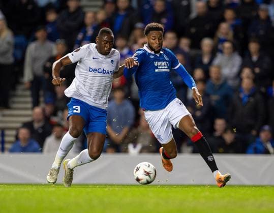 25th September 2025; Ibrox Stadium, Glasgow, Scotland; UEFA Europa League Football, Rangers versus Genk; Mujaid Sadick of KRC Genk and Youssef Chermiti of Rangers challenge for the ball  VagelisxGeorgariou