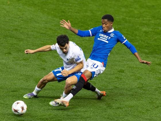 Jayden Meghoma of Rangers in action with Zakaria El Ouahdi of KRC Genk during UEFA Europa League league phase match at Ibrox Stadium, Glasgow. Rangers v KRC Genk - UEFA Europa League - Ibrox Stadium, Glasgow, Lanarkshire, Scotland, UK - 25 Sep 2025Glasgow Ibrox Stadium Lanarkshire, Scotland United Kingdom EDITORIAL USE ONLY  Copyright: xRangersxFC Shutterstockx 15504638g