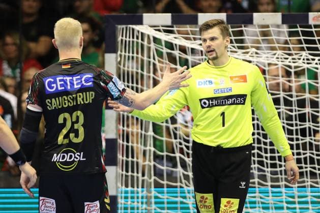 25.09.2025, xtgx, Handball, EHF Champions League, SC Magdeburg - Wisla Plock v.l. Magnus Saugstrup (Magdeburg, 23), Sergey Hernandez Ferrer (Magdeburg, 1) Jubel ueber den Sieg, Jubel nach Spielende Magdeubrg