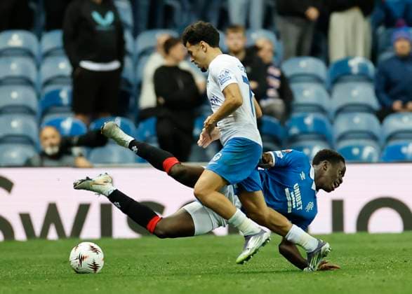 Rangers v KRC Genk UEFA Europa League Djeidi Gassama of Rangers is fouled by Zakaria El Ouahdi of KRC Genk during the UEFA Europa League match at Ibrox Stadium, Glasgow UK Newspapers OUT Copyright: xFredxPalmerx FIL-22274-0143