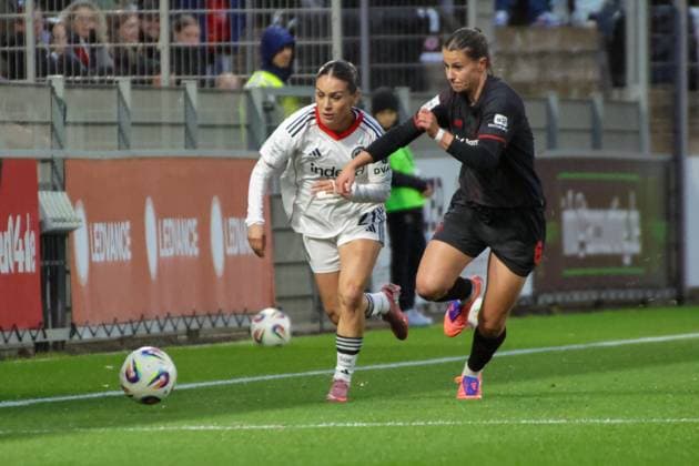 25.09.2025, xgrfx, Fussball Google Pixel Frauen-Bundesliga, Bayer Leverkusen - Eintracht Frankfurt v.l. Ereleta Memeti (Eintracht Frankfurt), Katharina Piljic (Bayer Leverkusen) (DFL DFB REGULATIONS PROHIBIT ANY USE OF PHOTOGRAPHS as IMAGE SEQUENCES and or QUASI-VIDEO) Leverkusen