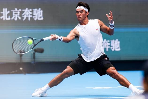 BEIJING, CHINA - SEPTEMBER 26: Yunchaokete Bu of China competes in the Men s Singles Round of 32 match against Alex De Minaur of Australia on day 5 of the 2025 China Open at National Tennis Center on September 26, 2025 in Beijing, China.  Copyright: xVCGx 111593329656