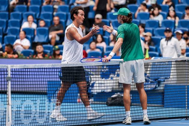 BEIJING, CHINA - SEPTEMBER 26: Yunchaokete Bu of China greets Alex De Minaur of Australia in the Men s Singles Round of 32 match on day 5 of the 2025 China Open at National Tennis Center on September 26, 2025 in Beijing, China.  Copyright: xVCGx 111593329566