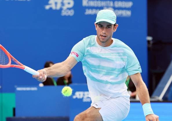 September 25, 2025, Tokyo, Japan - Nuno Borges of Portugal returns the ball against Taylor Fritz of the United States during a second round match of the Japan Open Tennis tournament in Tokyo on Friday, September 26, 2025. Fritz defeated Borges 7-5, 7-6. (photo by Yoshio Tsunoda AFLO) Noxthirdxpartyxsales  aflo_304826842