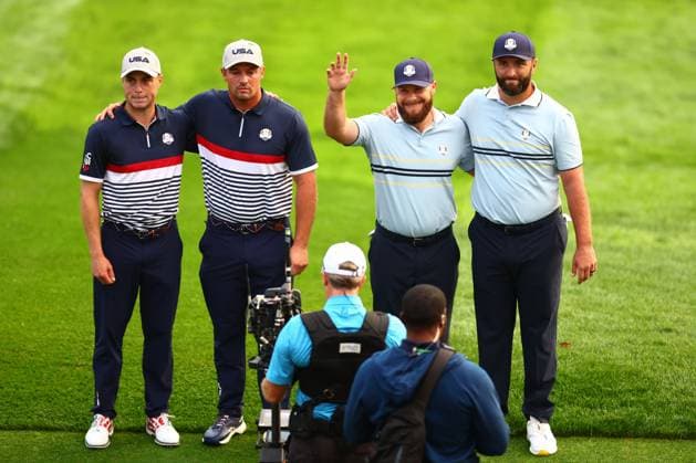 Bryson DeChambeau and Justin Thomas of Team USA with Tyrrell Hatton and Jon Rahm of Team Europe on the first tee 2025 Ryder Cup, Day One, Morning Foursomes, Golf, Bethpage Black Golf Course, New York, USA - 26 Sep 2025New York Bethpage Black Golf Course New York (NY) United States of America EDITORIAL USE ONLY No use with unauthorised audio, video, data, fixture lists, club league logos or live services. Online in-match use limited to 120 images, no video emulation. No use in betting, games or single club league player publications. Copyright: xJamesxMarsh Shutterstockx 15500199ak