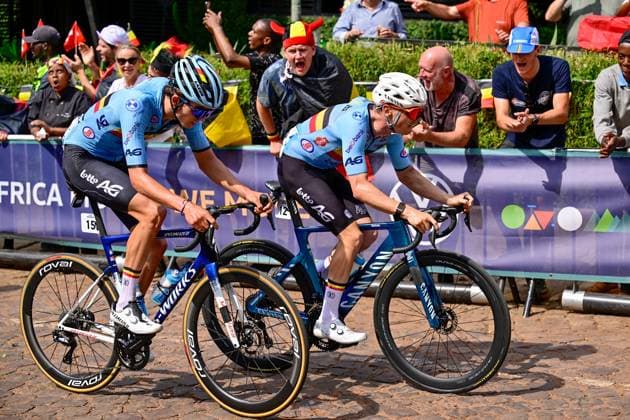 Belgian Jasper Schoofs and Belgian Aaron Dockx pictured in action during the u23 men road race (164,6 km) at the cycling road World Championships in Kigali, Rwanda, Friday 26 September 2025. The 2025 UCI Road World Championships take place from 21 to 28 September in Kigali, Rwanda. DIRKxWAEM  x135326821x