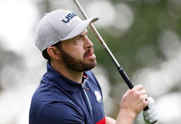 Patrick Cantlay of team United States hits a tee ball on the 4th tee box when he Xander Schauffele play a match against Robert MacIntyre and Viktor Hovland of team Europe at the 45th Ryder Cup at The Black Course at Bethpage State Park in Farmingdale, New York on Friday, September 26, 2025. Europe is the current holder of the Ryder Cup after its win over the United States in 2023 at Marco Simone Golf and Country Club.  RYD202509261012 JOHNxANGELILLO