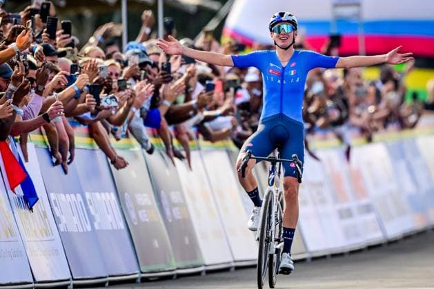 Italian Lorenzo Finn celebrates as he crosses the finish line to win the u23 men road race (164,6 km) at the cycling road World Championships in Kigali, Rwanda, Friday 26 September 2025. The 2025 UCI Road World Championships take place from 21 to 28 September in Kigali, Rwanda. DIRKxWAEM  x135331023x