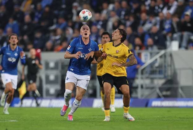 26.09.2025, xdcx, Fussball 2. Bundesliga, SV Darmstadt 98 - SG Dynamo Dresden, emonline, emspor, despor, v.l., Fraser Hornby (SV Darmstadt 98), Julian Pauli (SG Dynamo Dresden) DFL DFB REGULATIONS PROHIBIT ANY USE OF PHOTOGRAPHS AS IMAGE SEQUENCES AND OR QUASI-VIDEO.