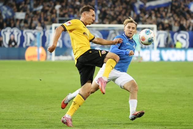 26.09.2025, xtvx, Fussball 2.Bundesliga, SV Darmstadt 98 - Dynamo Dresden v.l. Zweikampf, Duell, duel, tackle, compete Konrad Faber (SG Dynamo Dresden) Luca Marseiler (SV Darmstadt 98) (DFL DFB REGULATIONS PROHIBIT ANY USE OF PHOTOGRAPHS as IMAGE SEQUENCES and or QUASI-VIDEO) Darmstadt
