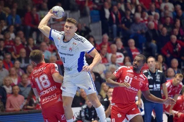 Nicolaj Joergensen (HSV Hamburg 11) beim Wurf; Florian Drosten (MT Melsungen 18), Sadou Ntanzi (MT Melsungen 91) (R) , GER, MT Melsungen - Handball Verein Hamburg, Handball, 1. Bundesliga, 6. Spieltag, Saison 2025 2026, 26.09.2025, GER, MT Melsungen - HSV Hamburg, Handball, 1. Bundesliga, 6. Spieltag, Saison 2025 2026, 26.09.2025 Kassel Copyright: xEibner-Pressefotox xRolandxSippelx EP_RSL