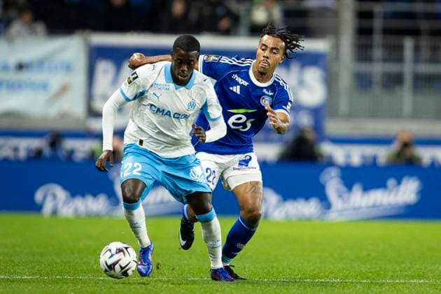 FOOTBALL: Ligue 1 Racing Strasbourg vs Marseille. 26 09 2025 STADE DE LA MEINAU GuÃ la DouÃ 22 (RCS) et Timothy Weah 22  Copyright: xelyxandroxcegarrax