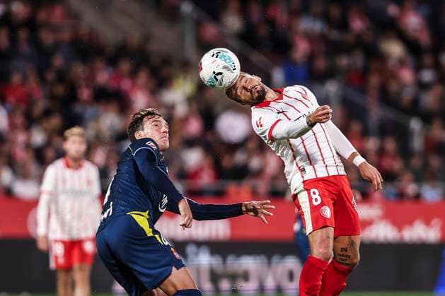 September 26, 2025, Girona, Girona, SPAIN: Portu of Girona FC and Urko Gonzalez de Zarate of RCD Espanyol in action during the Spanish league, La Liga EA Sports, football match played between Girona FC and RCD Espanyol at Montilivi stadium on September 26, 2025 in Girona, Spain. Girona SPAIN - ZUMAa181 20250926_zaa_a181_161 Copyright: xJavierxBorregox