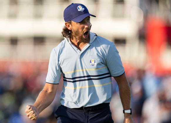 Tommy Fleetwood of Team Europe celebrates after sinking a putt on the sixteenth green during a four-ball match against Team United States on day one of the 45th Ryder Cup at the Bethpage Black Course in Farmingdale, New York on Friday, September 26, 2025. Europe has a 5.5 to 2.5 lead over the United States after the first day.  RYD20250926871 COREYxSIPKIN