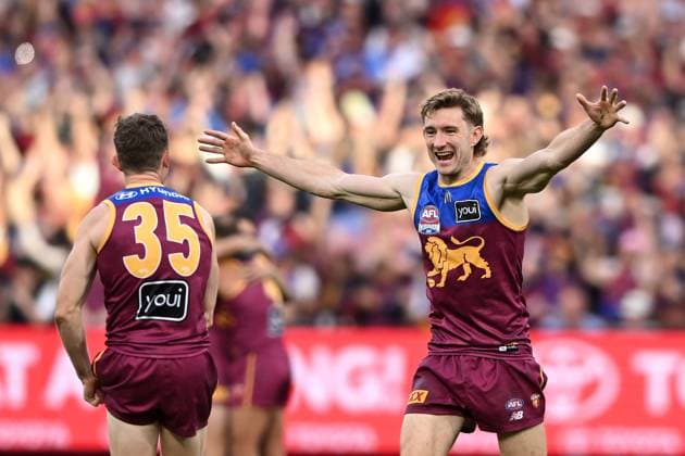 AFL GRAND FINAL, Harris Andrews of the Lions (right) celebrates following their win in the AFL Grand Final between the Geelong Cats and the Brisbane Lions at the Melbourne Cricket Ground in Melbourne, Saturday, September 27, 2025. ( NO ARCHIVING, EDITORIAL USE ONLY MELBOURNE VICTORIA AUSTRALIA  Copyright: xJAMESxROSSx 20250927157404367475