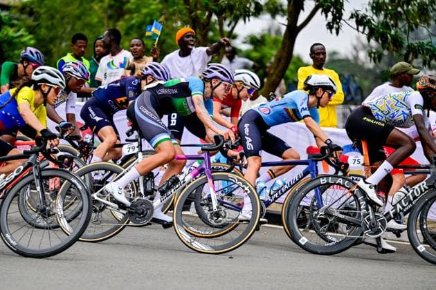 Uzbekistan Yanina Kuskova and Belgian Marieke Meert pictured in action during the elite women road race (164,6 km) at the cycling road World Championships in Kigali, Rwanda, Saturday 27 September 2025. The 2025 UCI Road World Championships take place from 21 to 28 September in Kigali, Rwanda. DIRKxWAEM  x135400588x