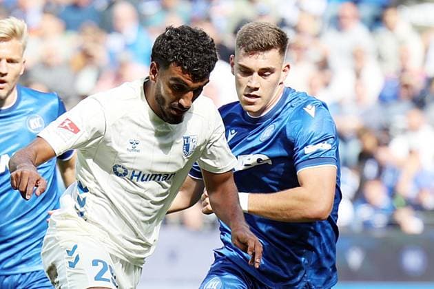 27.09.2025, xrekx, Fussball 2.Bundesliga, Karlsruher SC - 1.FC Magdeburg v.l. Rayan Ghrieb (1.FC Magdeburg) Marcel Beifus (Karlsruher SC) (DFL DFB REGULATIONS PROHIBIT ANY USE OF PHOTOGRAPHS as IMAGE SEQUENCES and or QUASI-VIDEO) Karlsruhe
