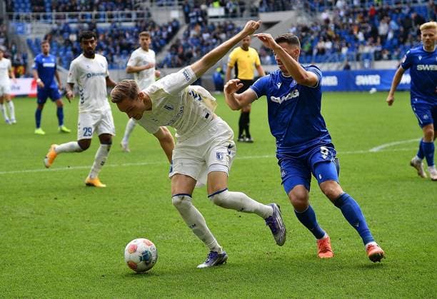 27.09.2025, xhbx, Fussball 2.Bundesliga, Karlsruher SC - 1.FC Magdeburg v.l. Maximilian Breunig (1.FC Magdeburg), Nicolai Rapp (Karlsruher SC KSC) (DFL DFB REGULATIONS PROHIBIT ANY USE OF PHOTOGRAPHS as IMAGE SEQUENCES and or QUASI-VIDEO) Karlsruhe