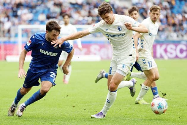 27.09.2025, xrekx, Fussball 2.Bundesliga, Karlsruher SC - 1.FC Magdeburg v.l. . Lilian Egloff (Karlsruher SC) Max Geschwill (1.FC Magdeburg) Foulspiel (DFL DFB REGULATIONS PROHIBIT ANY USE OF PHOTOGRAPHS as IMAGE SEQUENCES and or QUASI-VIDEO) Karlsruhe