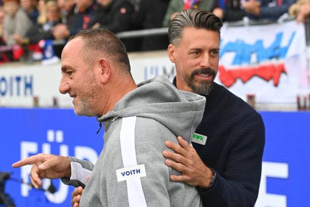 Sandro WAGNER (Trainer FC Augsburg), Frank SCHMIDT (Trainer Heidenheim,li), Fussball 1. Bundesliga Saison 2025 2026, 5.Spieltag, Spieltag05 1.FC Heidenheim - FC Augsburg am 27.09.2025, VOITH ARENA