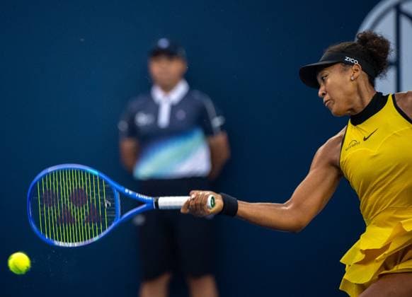 (250927) -- BEIJING, Sept. 27, 2025 -- Osaka Naomi hits a return during the women s singles second round match between Osaka Naomi of Japan and Aliaksandra Sasnovich of Belarus at 2025 China Open tennis tournament in Beijing, China, Sept. 27, 2025. ) (SP)CHINA-BEIJING-TENNIS-CHINA OPEN-WOMEN S SINGLES-SECOND ROUND (CN) HuxJingwen 