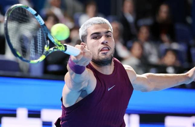 September 27, 2025, Tokyo, Japan - Carlos Alcaraz of Spain returns the ball against Zizou Berga of Belgium during a second round match of the Japan Open Tennis tournament in Tokyo on Saturday, September 27, 2025. Alcaraz defeated Bergs 6-4, 6-3. (photo by Yoshio Tsunoda AFLO) Noxthirdxpartyxsales  aflo_304949828