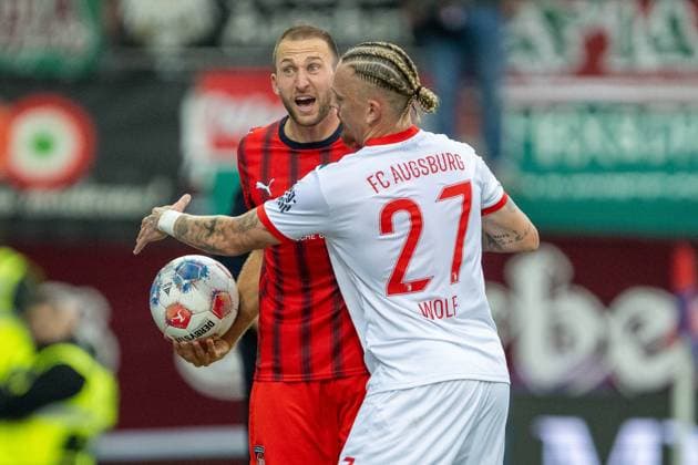 Jonas Foehrenbach (FC Heidenheim, 19), Marius Wolf (FC Augsburg, 27), GER, 1. FC Heidenheim vs. FC Augsburg, Fussball, Bundesliga, 5. Spieltag, Spielzeit 2025 2026, 27.09.2025, DFL DFB REGULATIONS PROHIBIT ANY USE OF PHOTOGRAPHS AS IMAGE SEQUENCES AND OR QUASI-VIDEO, GER, 1. FC Heidenheim vs. FC Augsburg, Fussball, Bundesliga, 5. Spieltag, Spielzeit 2025 2026, 27.09.2025 Heidenheim Copyright: xEibner-Pressefotox EP_EER
