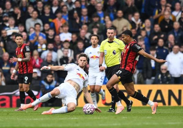 Anton Stach of Leeds United tackles Amine Adli of Bournemouth Leeds United v AFC Bournemouth, Premier League, Football, Elland Road, Leeds, UK - 27 Sep 2025Leeds Elland Road United Kingdom EDITORIAL USE ONLY No use with unauthorised audio, video, data, fixture lists, club league logos or live services. Online in-match use limited to 120 images, no video emulation. No use in betting, games or single club league player publications. Copyright: xRichardxLee Shutterstockx 15503912ad