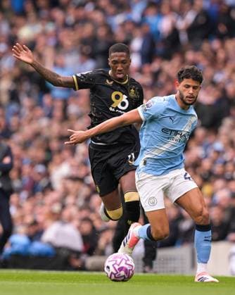 Matheus Nunes of Manchester City and Jaidon Anthony of Burnley Manchester City v Burnley, Premier League, Football, Etihad Stadium, Manchester, UK - 27 Sep 2025Manchester Etihad Stadium United Kingdom EDITORIAL USE ONLY No use with unauthorised audio, video, data, fixture lists, club league logos or live services. Online in-match use limited to 120 images, no video emulation. No use in betting, games or single club league player publications.  Copyright: xGreigxCowie Shutterstockx 15503920s