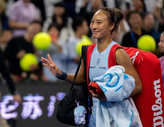 (250927) -- BEIJING, Sept. 27, 2025 -- Zheng Qinwen gestures after the women s singles second round match between Zheng Qinwen of China and Emiliana Arango of Colombia at 2025 China Open tennis tournament in Beijing, China, Sept. 27, 2025. ) (SP)CHINA-BEIJING-TENNIS-CHINA OPEN-WOMEN S SINGLES-SECOND ROUND (CN) HuxJingwen 
