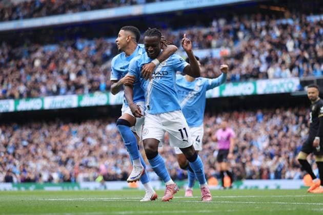 Football - Premier League - Manchester City v Burnley 27th September 2025 - Premier League - Manchester City v Burnley - Jeremy Doku of Manchester City (R) celebrates with Savinho of Manchester City after setting up their 1st goal - Photo: Simon Stacpoole Offside. Manchester UK Copyright: xSimonxStacpoolexOffside