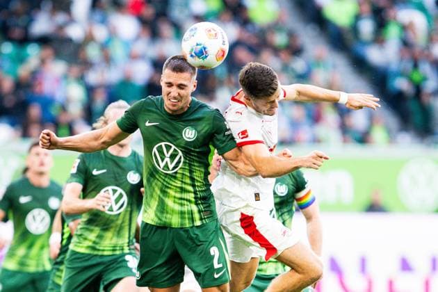 27.09.2025 - Fußball, 2025 2026, 1. Bundesliga, 5. Spieltag, VfL Wolfsburg - RB Leipzig: (L-R) Kilian Fischer (Wolfsburg), Christoph Baumgartner (Leipzig) DFL REGULATIONS PROHIBIT ANY USE OF PHOTOGRAPHS AS IMAGE SEQUENCES AND OR QUASI-VIDEO.