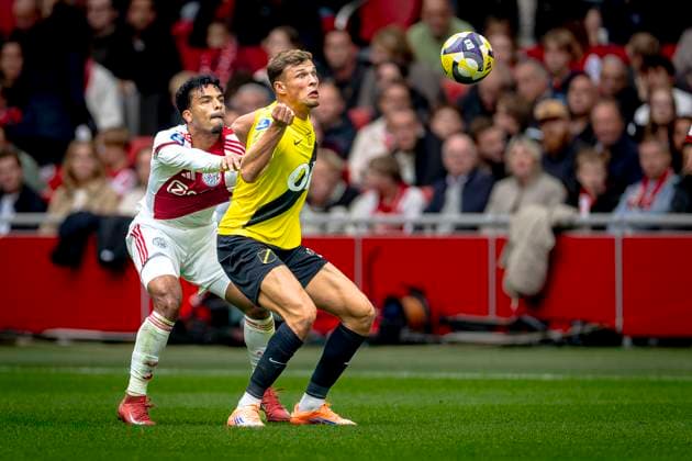 AFC Ajax Amsterdam defender Owen Wijndal, NAC Breda forwarder Sydney van Hooijdonk during the match AFC Ajax Amsterdam vs NAC Breda at the Johan Cruijff ArenA for the Dutch Vriendenloterij Eredivisie season 2025-2026 in AMSTERDAM, Netherlands on 27 september 2025, (photo by Marcel van Dorst EYE4images DeFodi Images) AFC Ajax Amsterdam defender Owen Wijndal, NAC Breda forwarder Sydney van Hooijdonk during the match AFC Ajax Amsterdam vs NAC Breda at the Johan Cruijff ArenA for the Dutch Vriendenloterij Eredivisie season 2025 2026 in AMSTERDAM, Netherlands on 27 september 2025, photo by Marcel van Dorst EYE4images DeFodi Images