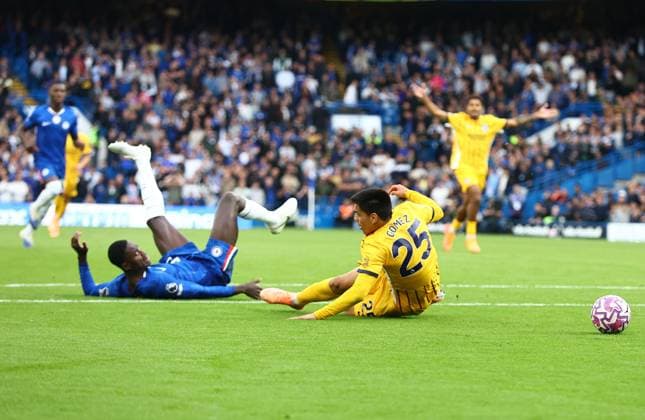 Diego Gomez of Brighton & Hove Albion is fouled by Trevoh Chalobah of Chelsea - red card given Chelsea v Brighton and Hove Albion, Premier League, Football, Stamford Bridge, London, UK - 27 Sep 2025London Stamford Bridge United Kingdom EDITORIAL USE ONLY No use with unauthorised audio, video, data, fixture lists, club league logos or live services. Online in-match use limited to 120 images, no video emulation. No use in betting, games or single club league player publications. Copyright: xMichaelxZemanek Shutterstockx 15503910aa