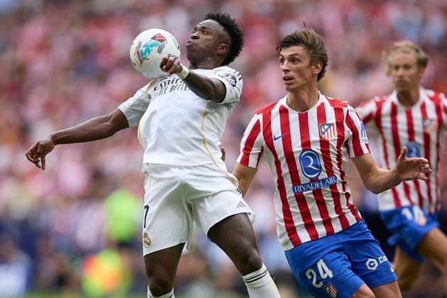 Vinicius Jr (Real Madrid CF) and Robin Le Normand (Atletico de Madrid) battle for the ball during the LaLiga EA Sports match between AtlÃ tico Madrid v Real Madrid at Riyadh Air Metropolitano on September 27, 2025 in Madrid, Spain. (Photo by Manu Reino DeFodi Images) Vinicius Jr Real Madrid CF and Robin Le Normand Atletico de Madrid battle for the ball during the LaLiga EA Sports match between AtlÃ tico Madrid v Real Madrid at Riyadh Air Metropolitano on September 27, 2025 in Madrid, Spain Photo by Manu Reino DeFodi Images