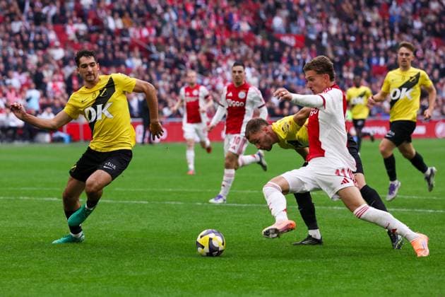 2025-09-27 AFC Ajax v NAC Breda - Dutch Eredivisie AMSTERDAM, NETHERLANDS - SEPTEMBER 27: Leo Greiml of NAC Breda, Boyd Lucassen of NAC Breda, Mika Godts of AFC Ajax during the Dutch Eredivisie match between AFC Ajax and NAC Breda at Johan Cruijff ArenA on September 27, 2025 in Amsterdam, Netherlands. Amsterdam Johan Cruijff ArenA Netherlands Content not available for redistribution in The Netherlands directly or indirectly through any third parties. Copyright: xBenxGalx