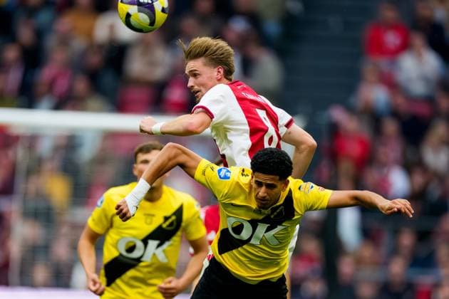 AMSTERDAM, 27-09-2025, Johan Cruijff ArenA , season 2025 2026 , Dutch Eredivisie Football . Match between Ajax and NAC Breda , Picture shows Ajax player Kenneth Taylor and NAC Breda player Mohamed Nassoh Ajax - NAC  x31222632x Copyright: