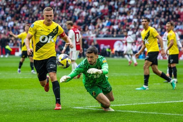 AMSTERDAM , 27-09-2025 , Johan Cruyff ArenA , season 2025 2026 , Dutch Eredivisie football . Match between Ajax and NAC Breda , Picture shows NAC Breda goalkeeper Daniel Bielica and NAC Breda player Boy Kemper (final score 2-1). Ajax - NAC  x31226539x Copyright: