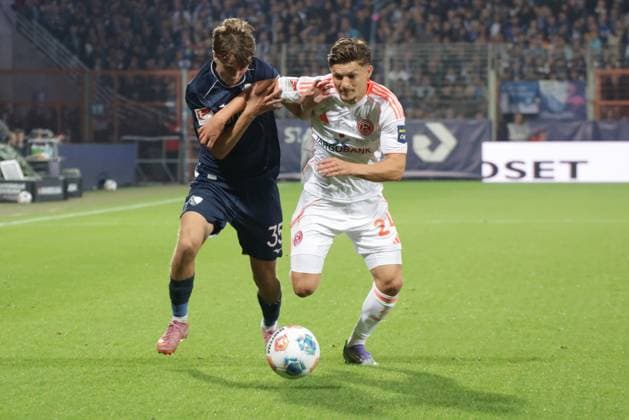 27.09.2025, xgrfx, Fussball 2.Bundesliga, VfL Bochum - Fortuna Duesseldorf v.l. Kacper Koscierski (VfL Bochum), Moritz Heyer (Fortuna Düsseldorf) (DFL DFB REGULATIONS PROHIBIT ANY USE OF PHOTOGRAPHS as IMAGE SEQUENCES and or QUASI-VIDEO) Bochum
