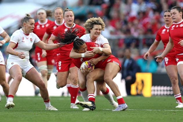 WRWC Final 27 September 2025, London - Women™s Rugby World Cup Final - Canada v England Women - Ellie Kildunne of England tackles Asia Hogan-Rochester of Canada - Photo: Charlotte Wilson Offside. London UK Copyright: xCharlottexWilsonx xOffsidexOffside