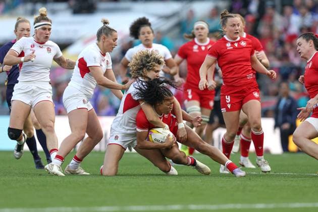 WRWC Final 27 September 2025, London - Women™s Rugby World Cup Final - Canada v England Women - Ellie Kildunne of England tackles Asia Hogan-Rochester of Canada - Photo: Charlotte Wilson Offside. London UK Copyright: xCharlottexWilsonx xOffsidexOffside