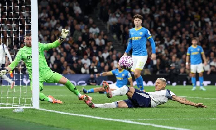 London, England, 27th September 2025. Richarlison of Tottenham Hotspur slides in towards the goal but fails to reach the ball during the Tottenham Hotspur vs Wolverhampton Wanderers Premier League match at the Tottenham Hotspur Stadium, London. Picture credit should read: Paul Terry Sportimage EDITORIAL USE ONLY. No use with unauthorised audio, video, data, fixture lists, club league logos or live services. Online in-match use limited to 120 images, no video emulation. No use in betting, games or single club league player publications. SPI_028_PT_Tottenham_Wolves SPI-4168-0028