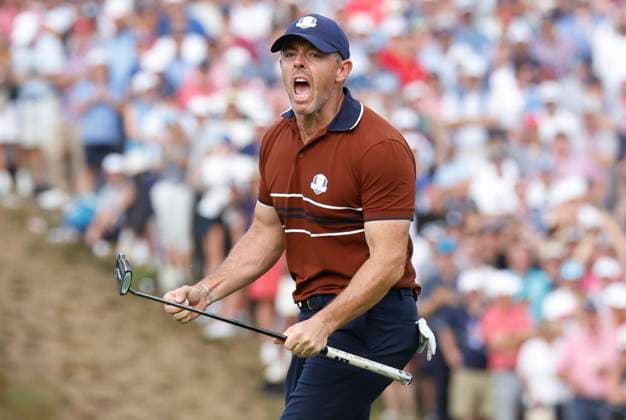 Rory McIlroy of Team Europe reacts after sinking a birdie putt on the fourteenth green during a four-ball match against Team United States on day two of the 45th Ryder Cup at the Bethpage Black Course in Farmingdale, New York on Saturday, September 27, 2025. Europe has a 8.5 to 3.5 lead over the United States after the morning foursome matches on the second day.  RYD20250927616 JOHNxANGELILLO