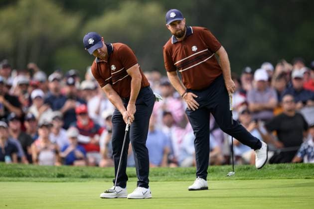 250927 Rory McIlroy and Shane Lowry of Team Europe during a fourball match on day 2 of The Ryder Cup on September 27, 2025 in New York. Photo: Jesper Zerman BILDBYRAN kod JZ JZ0618 golf ryder cup day 2 bbeng Copyright: JESPERxZERMAN BB250927JZ089