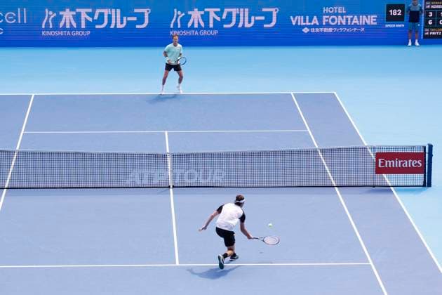 September 28, 2025, Tokyo, Japan: Taylor Fritz of the USA (down) in action against fellow American Sebastian Korda (up) during their quarterfinals match at the Japan Open Tennis Championships at Ariake Colosseum in Tokyo. The tournament runs from September 22 to 30. Fritz won 6-3, 6(5)-7, 6-3. Tokyo Japan - ZUMAm191 20250928_aap_m191_016 Copyright: xRodrigoxReyesxMarinx