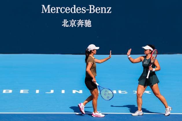 BEIJING, CHINA - SEPTEMBER 28: Wu Fang-Hsien of Chinese Taipei and Eri Hozumi of Japan compete in the Women s Doubles Round of 32 match against Maya Joint of Australia and Catherine Mcnally of the United States on day 7 of the 2025 China Open at National Tennis Center on September 28, 2025 in Beijing, China.  Copyright: xVCGx 111593672645